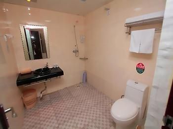 Jinzuan 100 Holiday Hotel Qufu Bagian luar foto